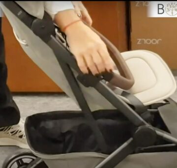 Novo apoio de braços Joolz aer+ fecha com o carrinho