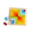 Jogo Criativo De Composição 3D da Haba, composto por peças em várias cores vibrantes, incluindo vermelho, azul, verde, amarelo e laranja.